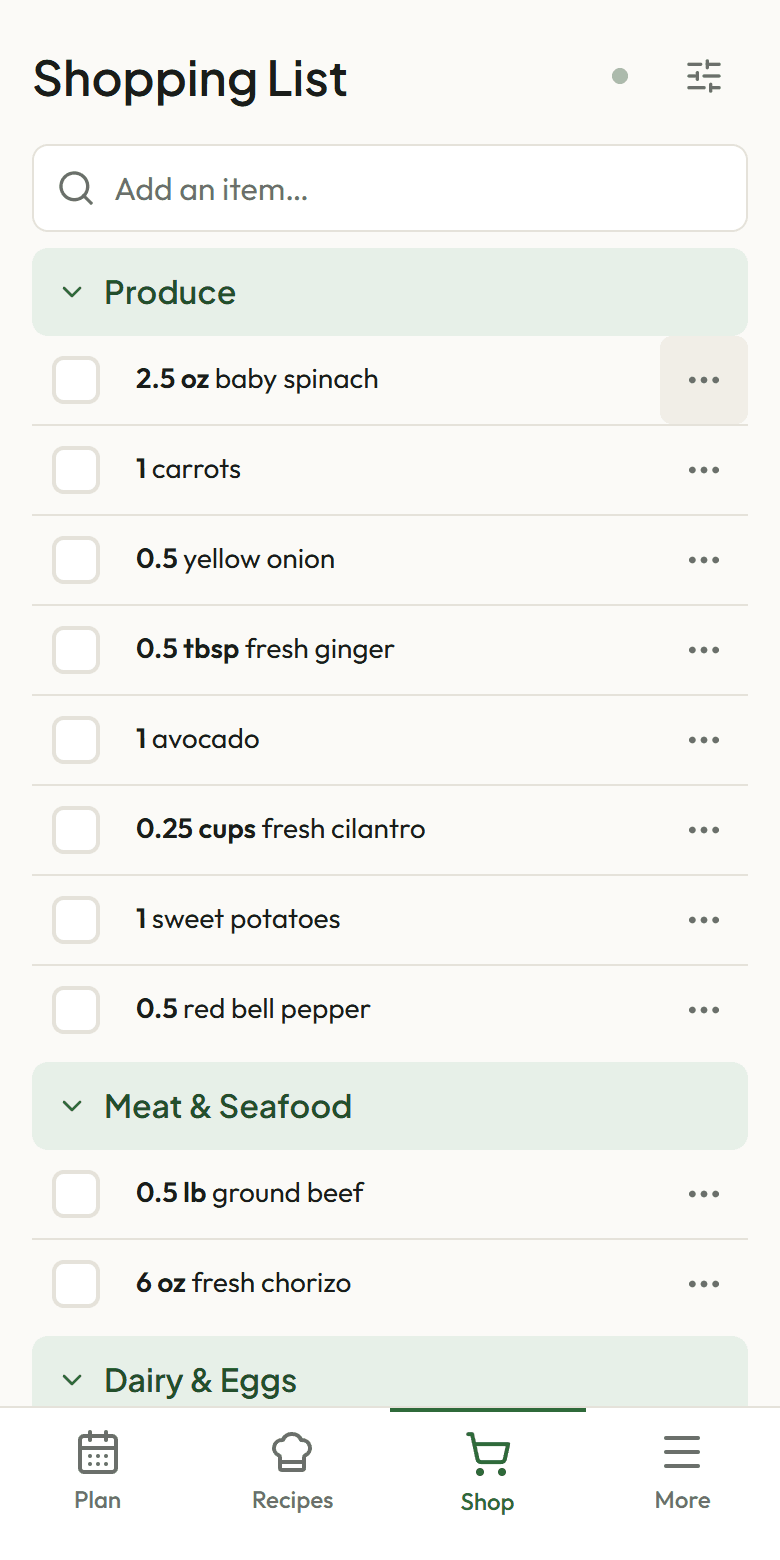 The shopping list screen: items grouped under Produce and Meat & Seafood headings with checkboxes